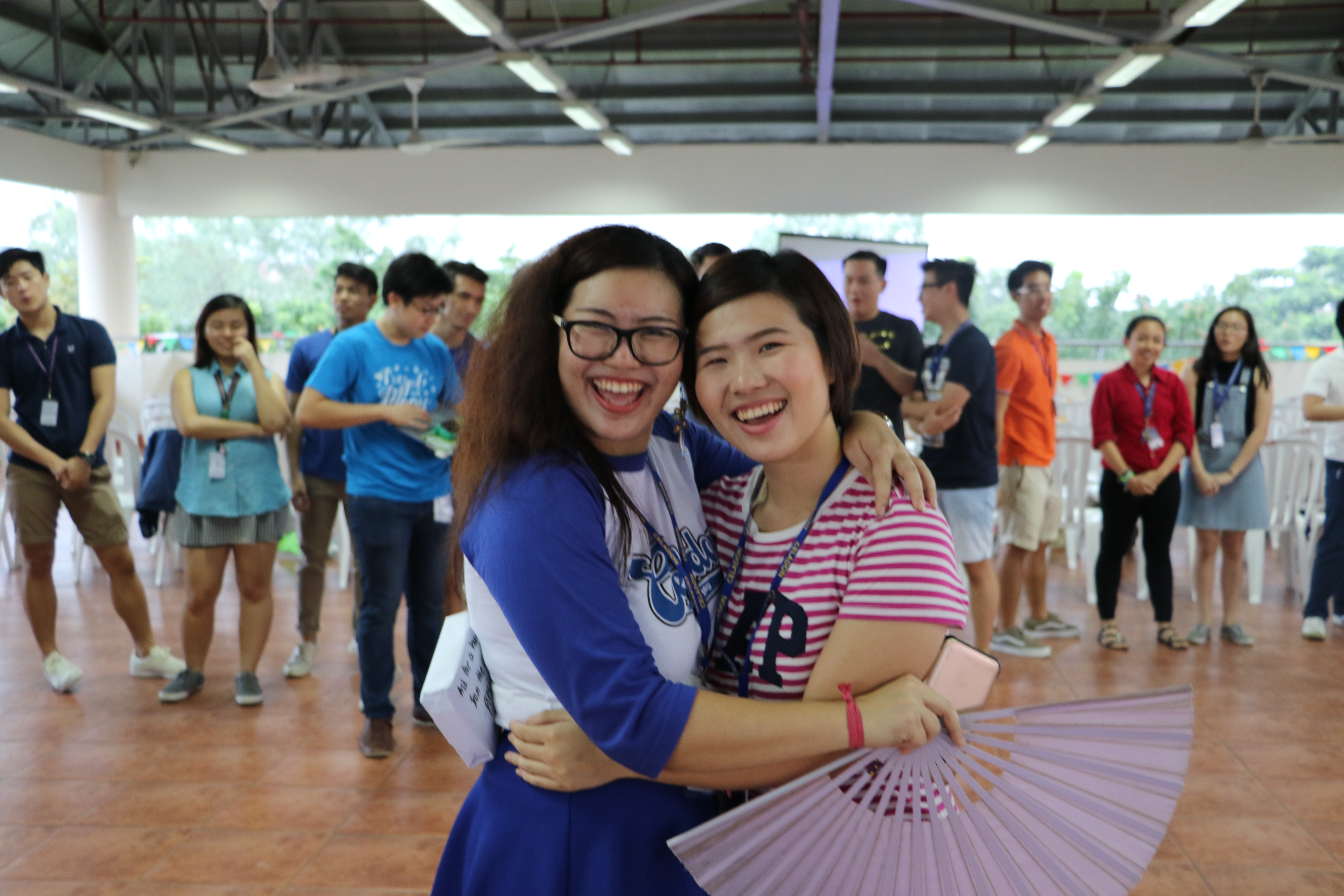 A Celadon member shares a warm welcoming hug from the President herself. Photo by Mark Yu.